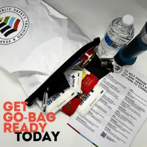 On a white table sits a white bag holding a red pill bottle and a water bottle, with 'Get go bag ready today' written in the bottom left corner